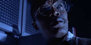 Samuel L. Jackson is stalked at night by predators in Jurassic Park