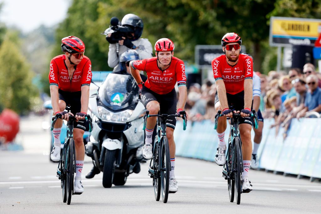 PEER BELGIUM AUGUST 26 LR Matis Louvel of France Arnaud Dmare of France injured after being involved in a crash and Clment Russo of France And Team ArkaSamsic cross the finish line during the 19th Renewi Tour 2023 Stage 4 a 1794km stage from Beringen to Peer UCIWT on August 26 2023 in Peer Belgium Photo by Bas CzerwinskiGetty Images