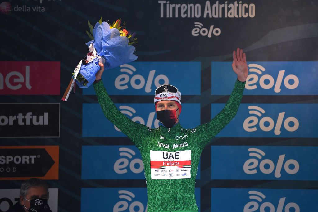 CASTELFIDARDO ITALY MARCH 14 Podium Tadej Pogacar of Slovenia and UAE Team Emirates Green Mountain Jersey Celebration during the 56th TirrenoAdriatico 2021 Stage 5 a 205km stage from Castellalto to Castelfidardo 175m Mask Covid Safety Measures TirrenoAdriatico on March 14 2021 in Castelfidardo Italy Photo by Tim de WaeleGetty Images