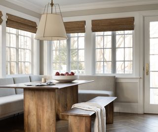 dining nook with banquette with windows all round