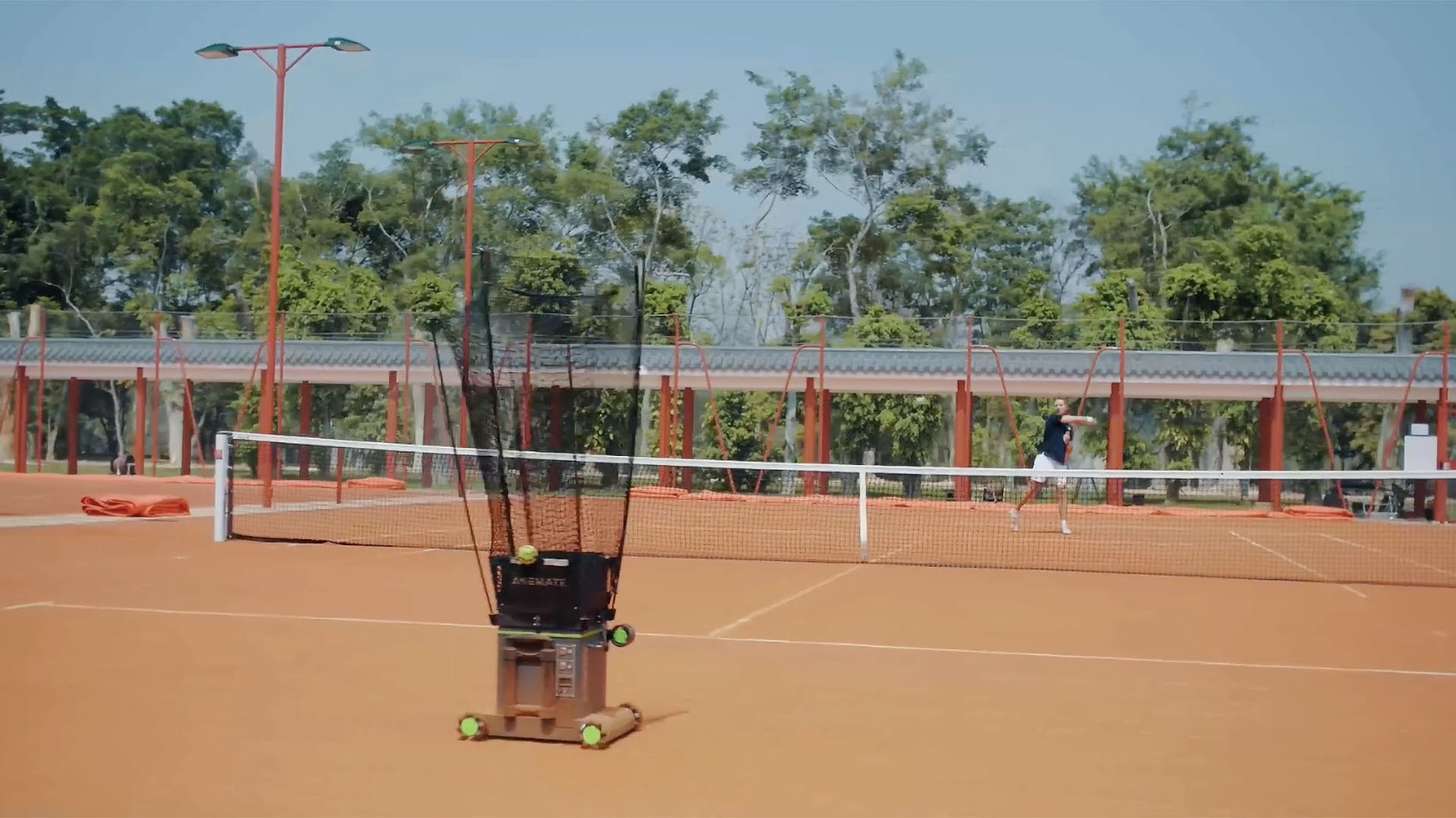A picture of the Acemate Tennis Robot on a court.