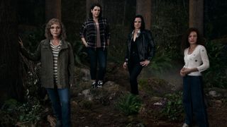 The main four surviving adults in Yellowjackets season 1 stand in the woods