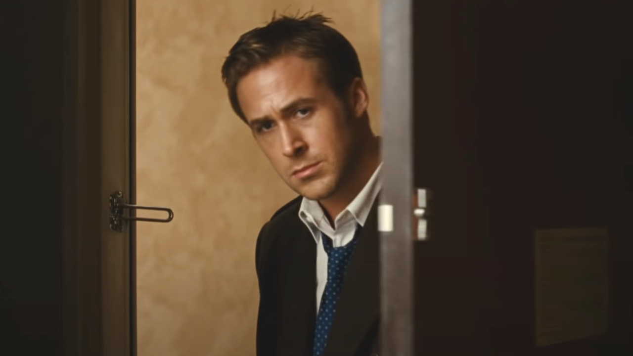 Ryan Gosling looks sad when he stands in the door of a hotel room in Ides in March.