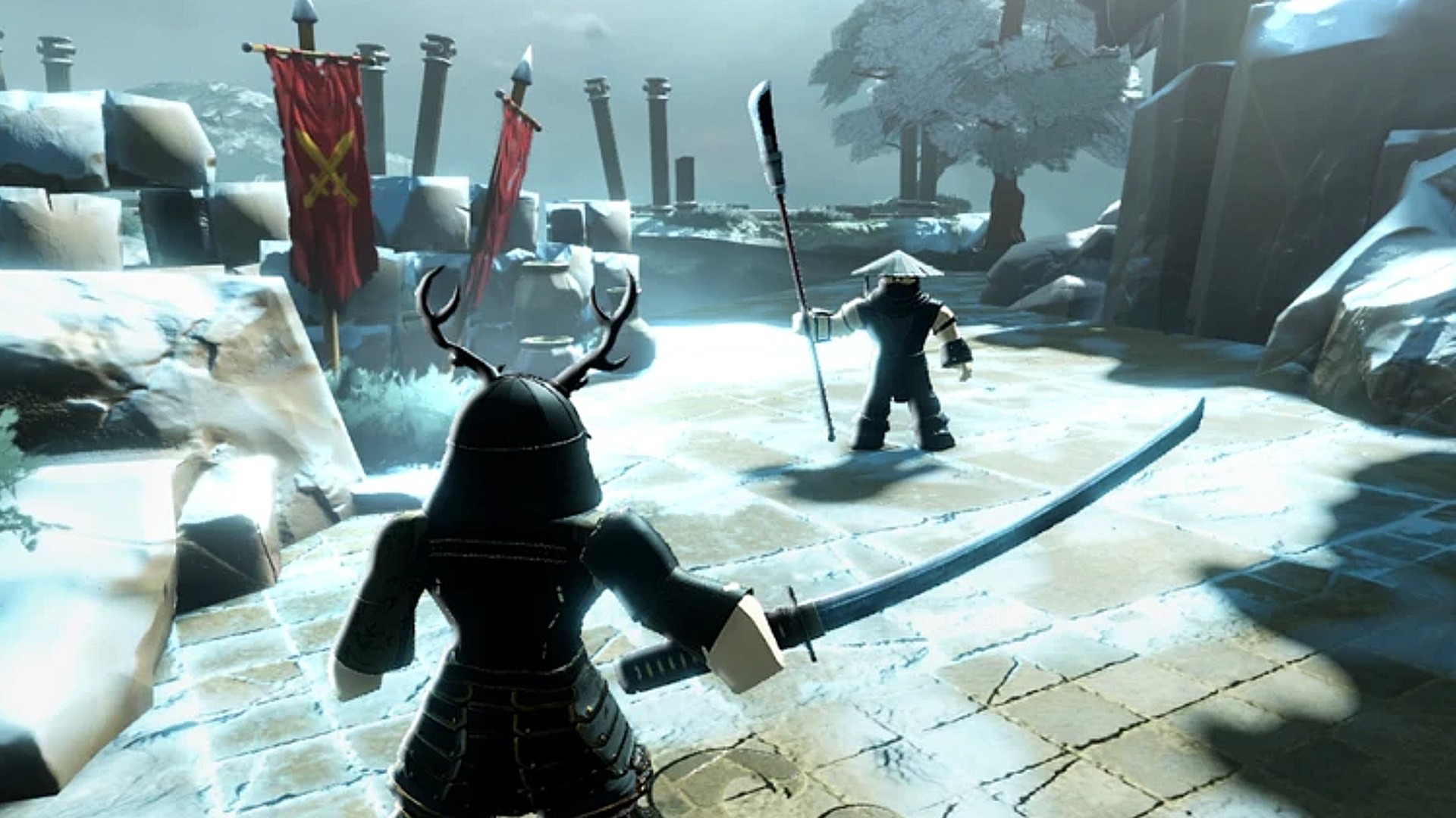 Two players battle on a snowy arena in Dueling Grounds.