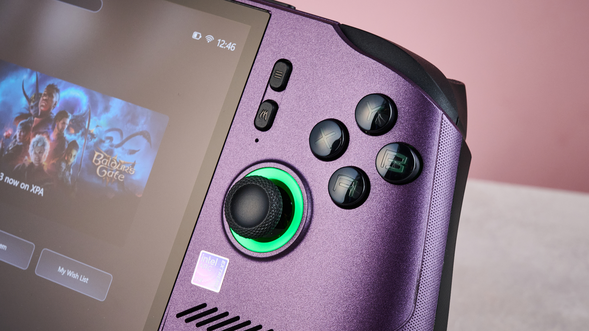 A closeup of the MSI Claw 8 EX AI+, showing its right thumbstick, face buttons, Menu button and MSI Center M button.