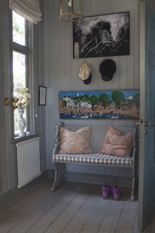 doorway bench In a Swedish traditional summer home on an island