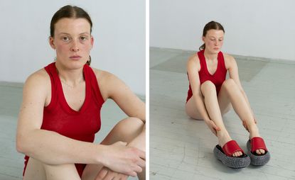 Woman in Resort 2023 red Extreme Cashmere vest and crystal embellished wedge sandal by JW Anderson