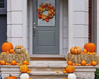 pumpkins and hay bales outside front door
