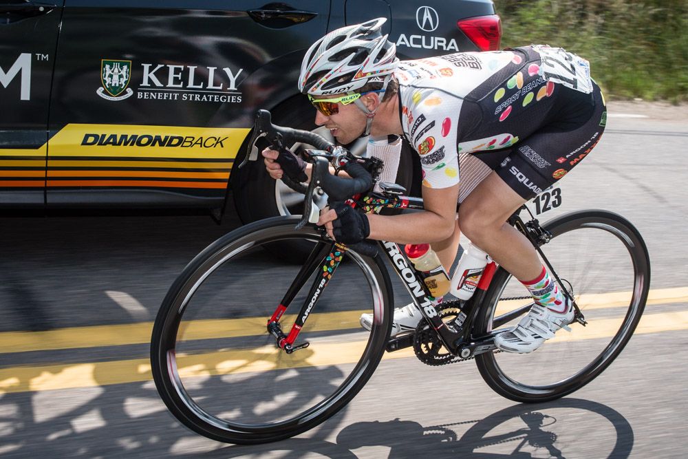 Steve Fisher (Jelly Belly) makes his way back through the caravan