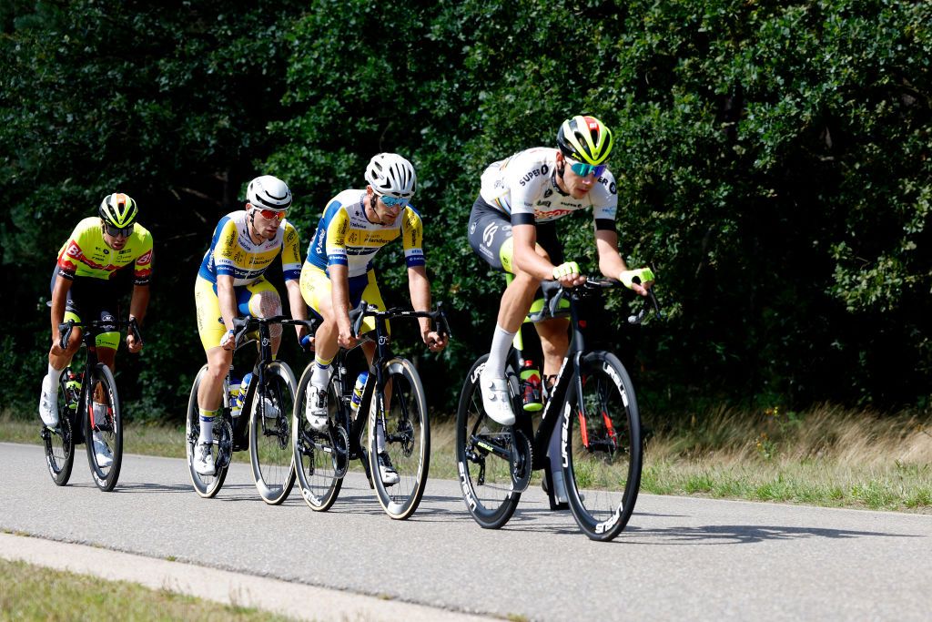 PEER BELGIUM AUGUST 26 A general view of Kamiel Bonneu of Belgium and Team FlandersBaloise Ludovic Robeet of Belgium and Team Bingoal WB White Combativity Jersey Aaron Van Poucke of Belgium and Team FlandersBaloise and Criel Desal of Belgium and Team Bingoal WB compete in the breakaway during the 19th Renewi Tour 2023 Stage 4 a 1794km stage from Beringen to Peer UCIWT on August 26 2023 in Peer Belgium Photo by Bas CzerwinskiGetty Images