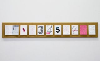 illustrated numerical alphabet on a white wall