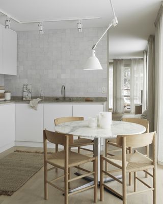 white kitchen with limestone worktop