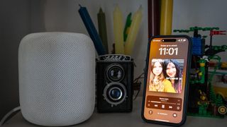 Ariane X sone playing on iPlayer next to Apple HomePod