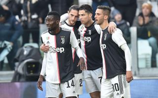 Cristiano Ronaldo, second from right, celebrates with team-mates after scoring Juventus' second goal