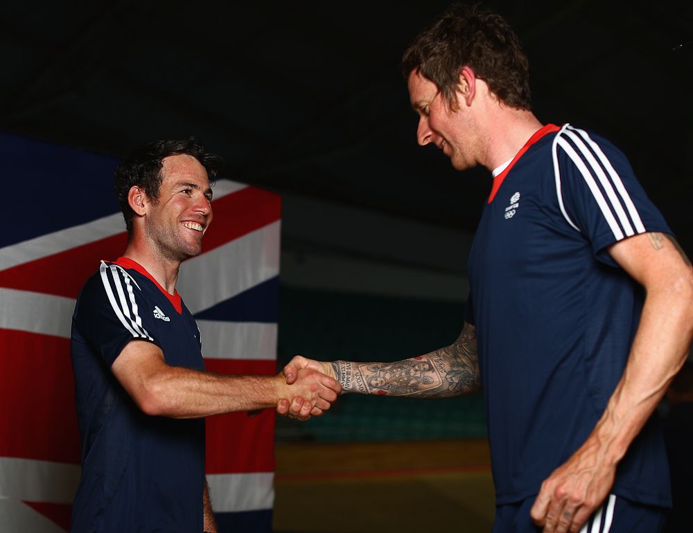 Mark Cavendish chats with Bradley Wiggins at a press conference announcing the Great Britain track cyclists selected to ride in the Rio 2016 Olympic Games