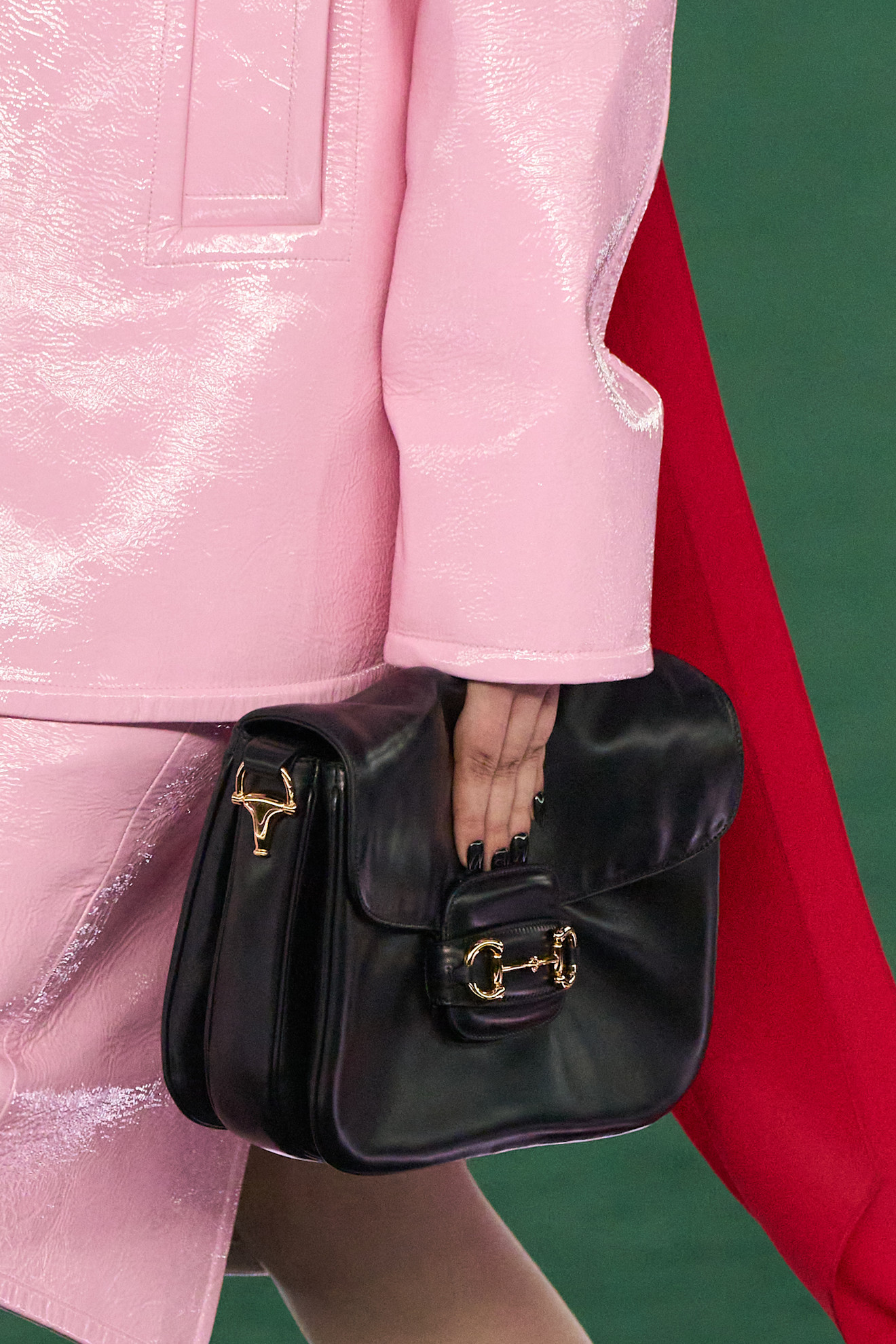 Gucci bag held in hand