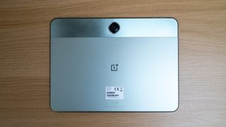 OnePlus Pad Go from behind on a wooden table