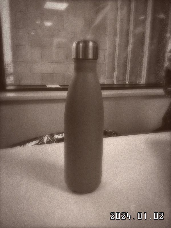 A purple Chillys bottle shot on the Leica Sofort 2
