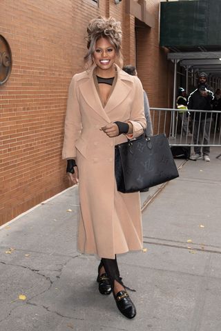 Laverne Cox carrying a Louis Vuitton bag
