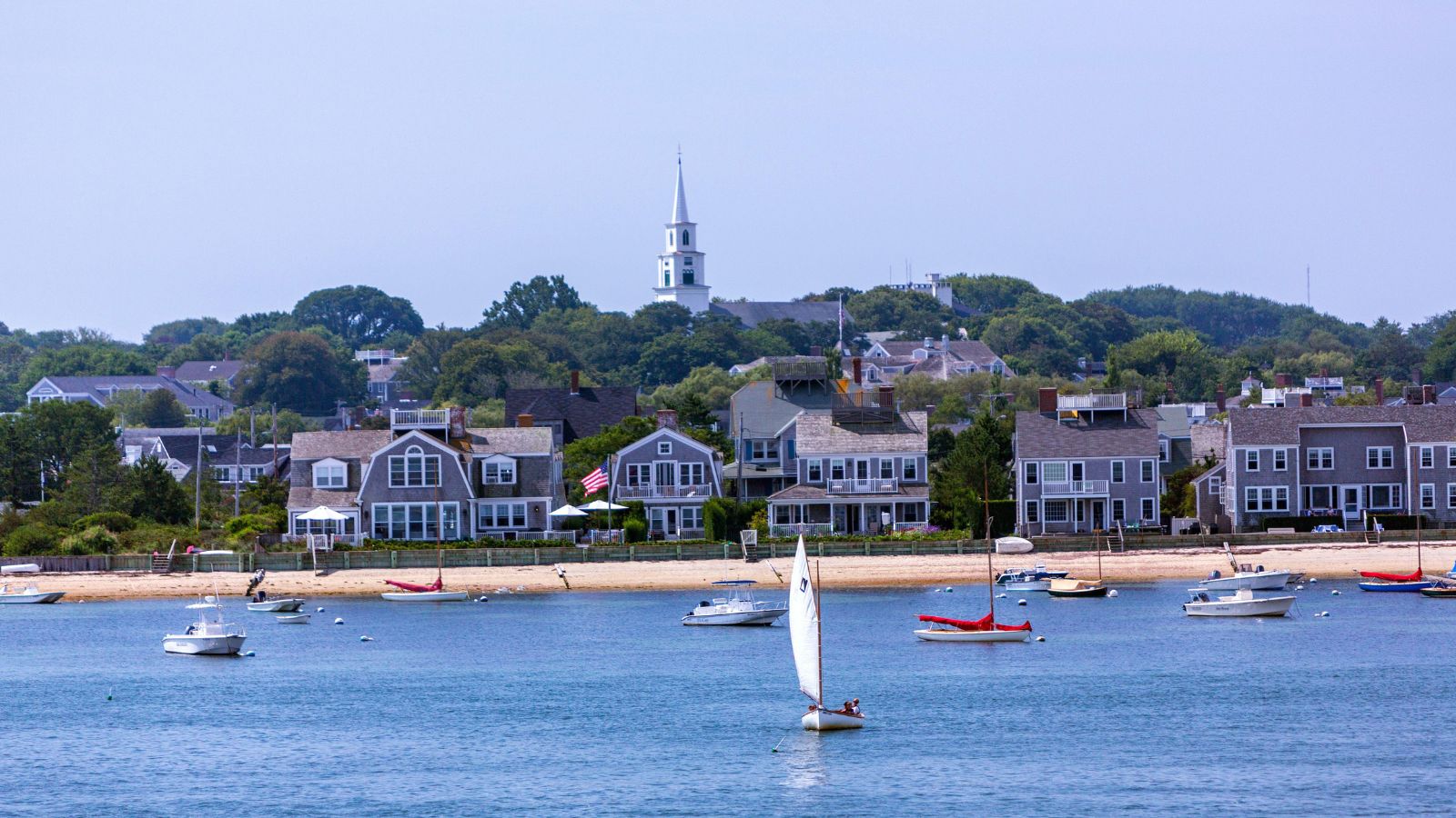 Nantucket landscape with boats, boathouses and the beach