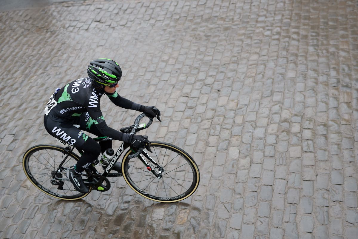 Valentina Scandolara (WM3) bounces across the slippery cobbles at the 112.8 km Le Samyn des Dames