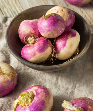 purple turnips on table in a bowl