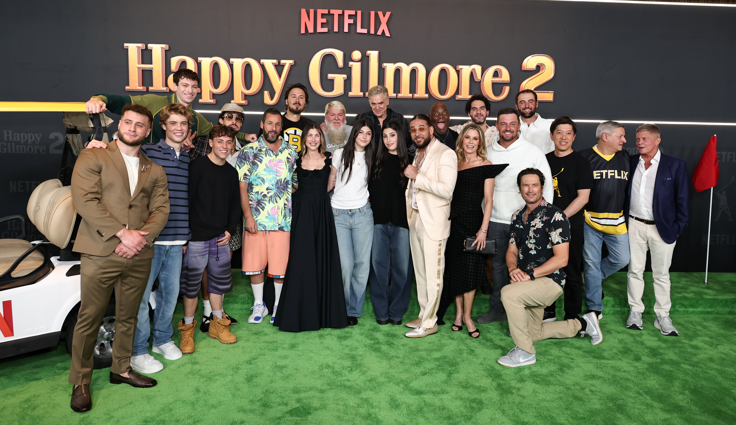 The cast of Happy Gilmore 2 pose for a photo