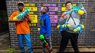 RAPID (SEYI), LICCLE BIT (SAMSON), MCKAY (NOAH) with water pistols in Crongton.