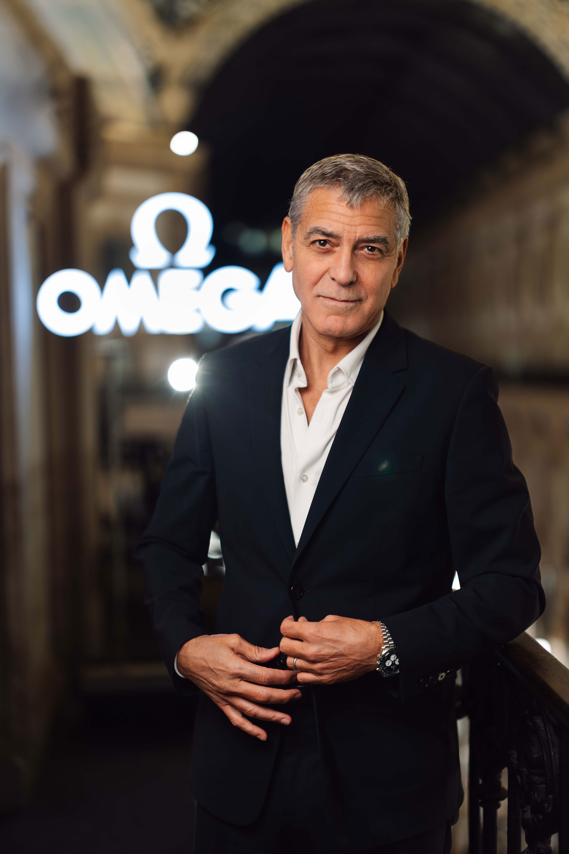 George Clooney wears an Omega watch