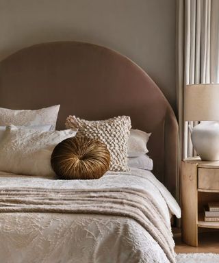 Neutral bedroom with textured bed pillows