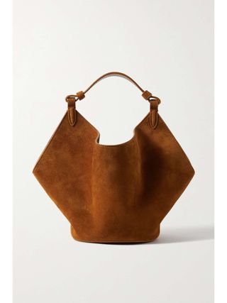 Tas jinjing mini berbahan suede dari Lotus