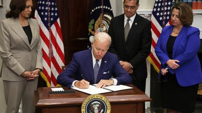  U.S. President Joe Biden signs an executive order on access to reproductive health care services as (L-R) Vice President Kamala Harris, Secretary of Health and Human Services Xavier Becerra look on