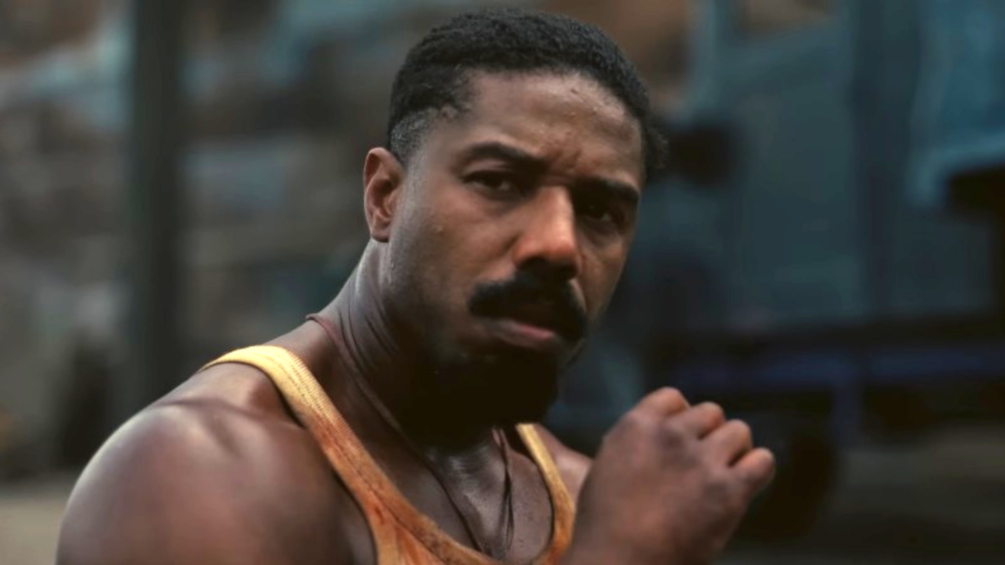 A screenshot of Michael B. Jordan looking concerned in Sinners.