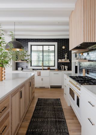 a modern white and wood shaker kitchen