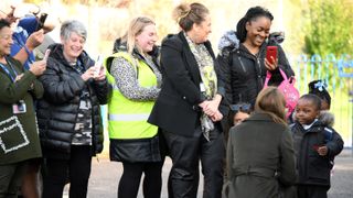 Catherine, Princess of Wales talks with children as she leaves after her visit to Colham Manor Children's Centre in Hillingdon with the Maternal Mental Health Alliance on November 9, 2022 in Uxbridge, England.