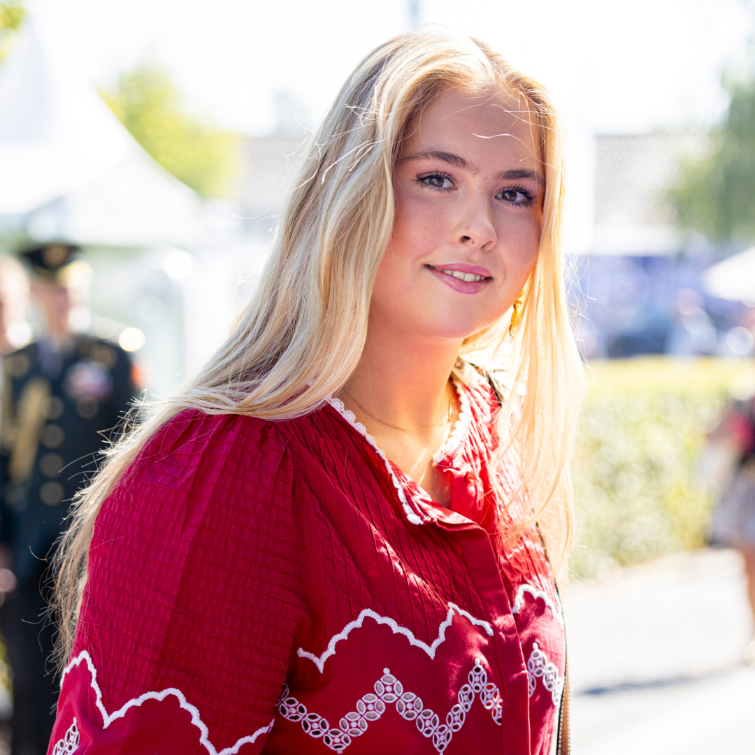 Princess Catharina Amalia wearing a red top and smiling