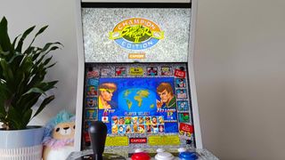 Evercade Alpha with Street Fighter 2 character select on screen