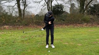 Jess Ratcliffe swinging with one hand