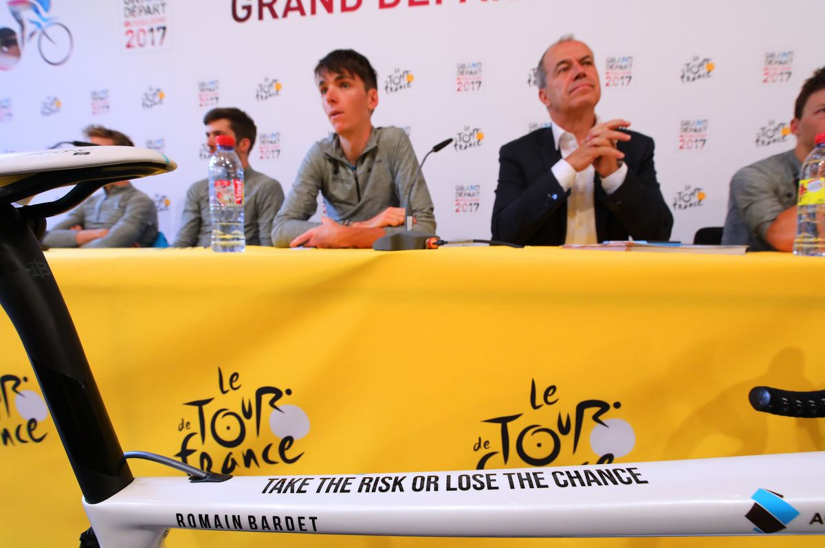 "Take the risk or lose the challenge" is the message on Bardet's top tube