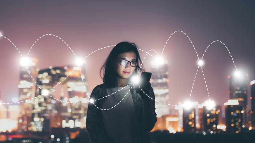 Social connection/network concept. Woman hold her phone with digital dashed lines stretching out of the phone.