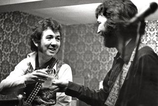 Ronnie and Eric Clapton playing the Drum And Monkey in Shropshire in 1977