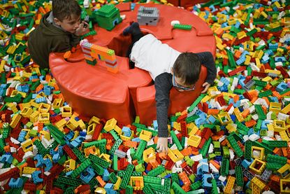 Children play with Lego toys at Europe's largest Lego event.