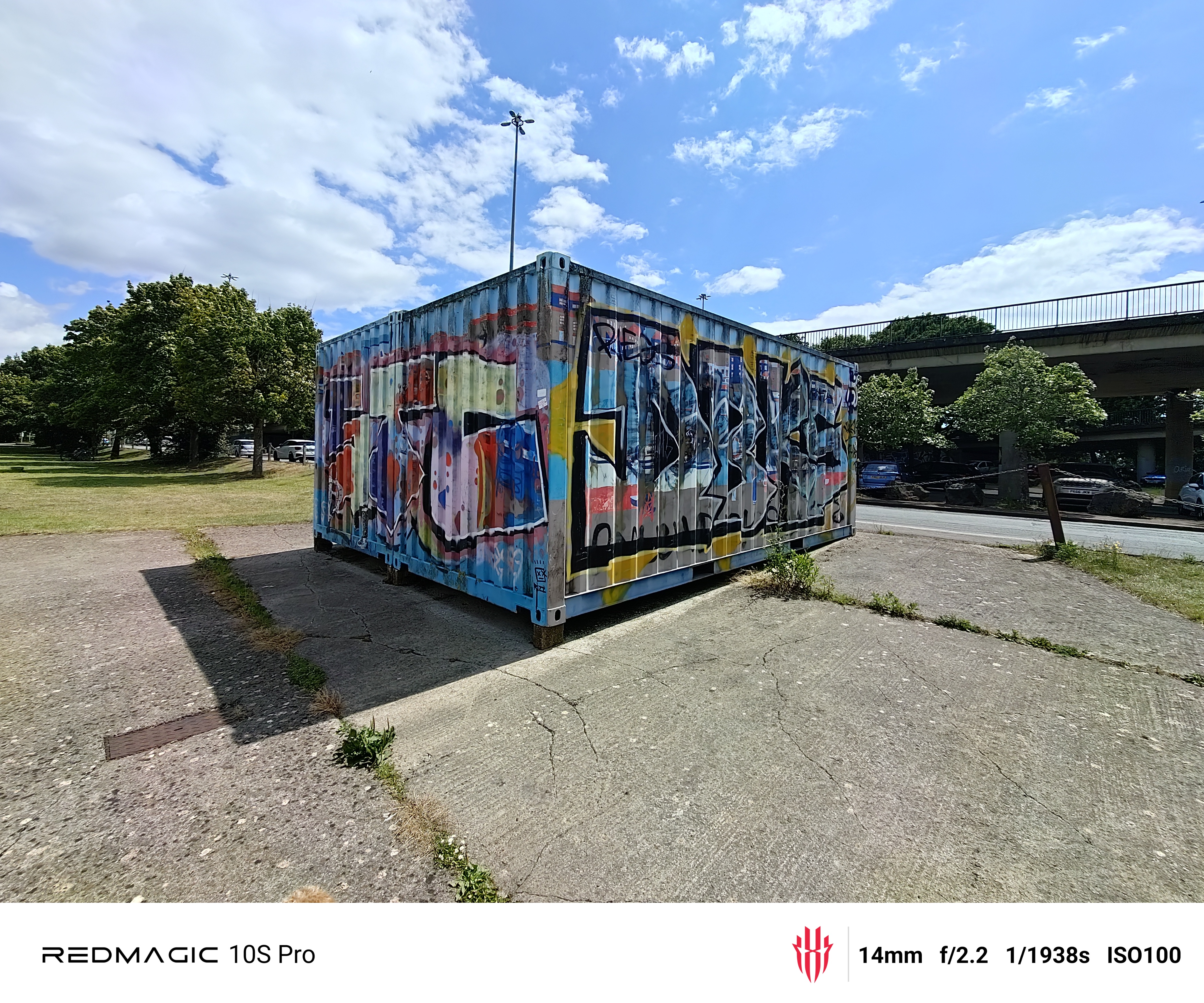 Image of graffiti covered shipping container shot on RedMagic 10S Pro with ultra wide lens