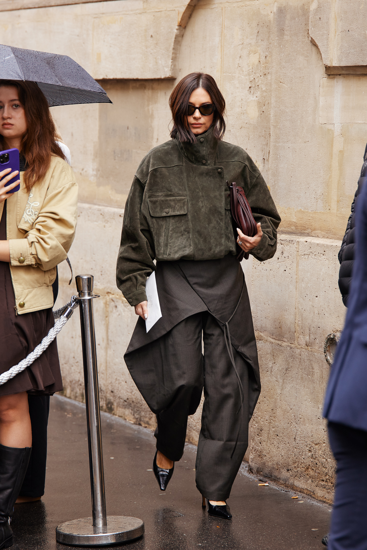 A Paris Fashion Week attendee shows off their outfit.