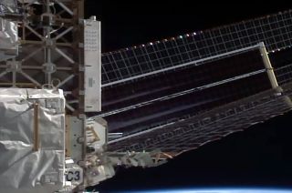 The second of six International Space Station (ISS) Rollout-Out Solar Arrays (iROSA) is seen after it was fully deployed on the orbiting outpost's port 6 (P6) truss, augmenting its 4B power channel, during a spacewalk by NASA astronaut Shane Kimbrough and European Space Agency astronaut Thomas Pesquet on Friday, June 25, 2021.