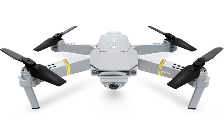 Person holding the Eachine E58 Pro drone