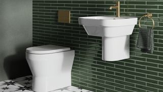 white wall hung sanitaryware with green bathroom tiles