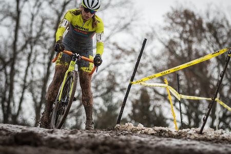 Rebecca Fahringer stays upright in the mud and snow