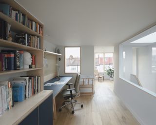 Study with a bookcase and lots of natural light