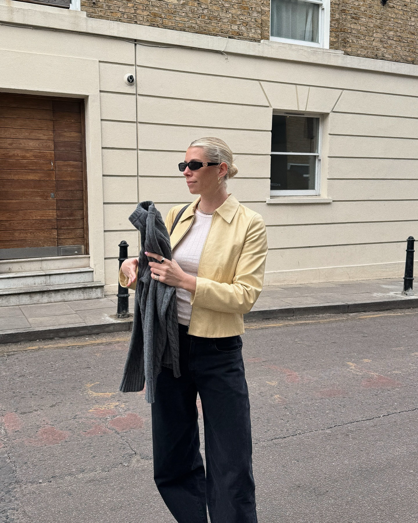 @lindseyholland_ wearing 90s-style sunglasses.